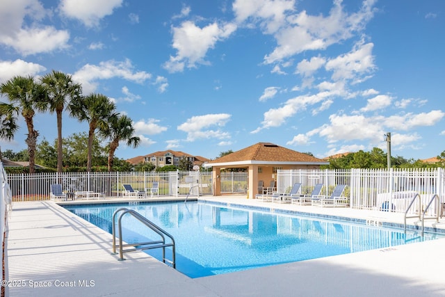 2464 Bayhill Dr, Melbourne, FL 32940 - community pool featuring fence and a patio area
