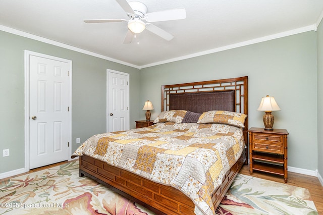 1435 Xavier Ave SE, Palm Bay, FL 32909 - bedroom with light wood-style floors, baseboards, crown molding, and ceiling fan