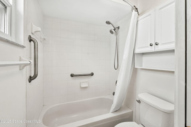 full bathroom with toilet and shower / bath combo with shower curtain