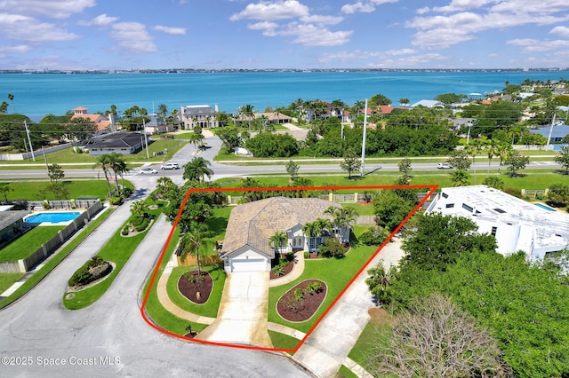 drone / aerial view with a water view