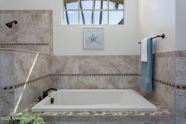 full bathroom featuring a garden tub and a tile shower