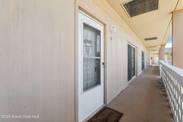 doorway to property featuring visible vents