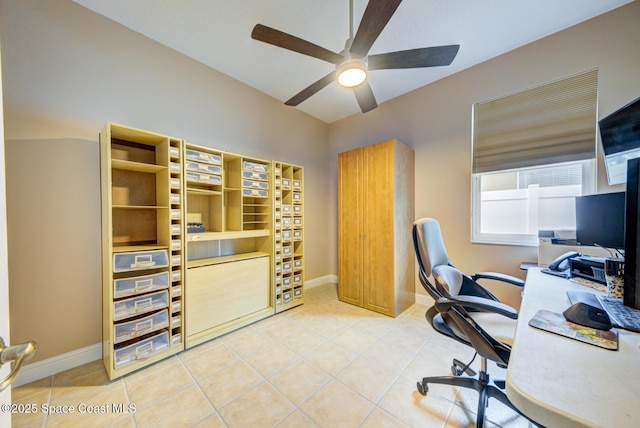 office with light tile patterned floors, baseboards, and ceiling fan