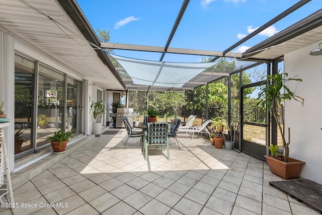 107 Algonquin Ter, Indian Harbour Beach, FL 32937 - sunroom with outdoor dining space
