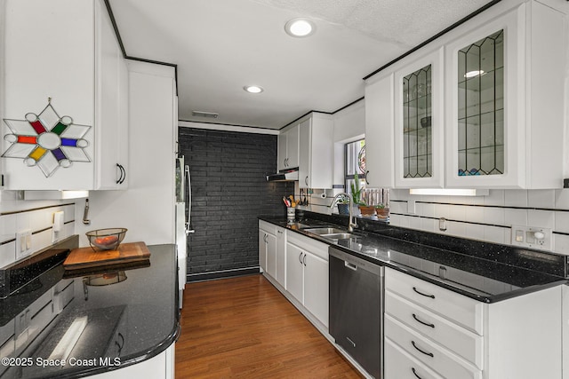 107 Algonquin Ter, Indian Harbour Beach, FL 32937 - kitchen featuring stainless steel dishwasher, a sink, white cabinets, dark wood-style flooring, and recessed lighting