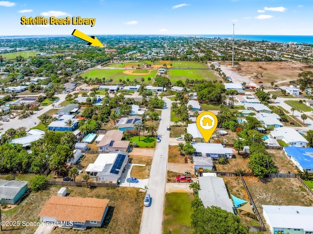 107 Algonquin Ter, Indian Harbour Beach, FL 32937 - aerial view of residential area with a large body of water
