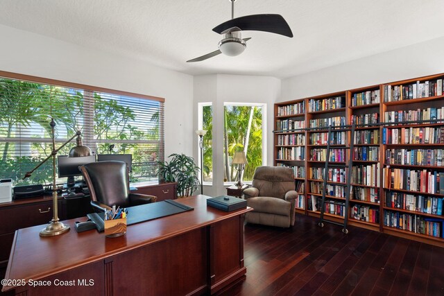 1495 Newfound Harbor Dr, Merritt Island, FL 32952 - office area featuring a healthy amount of sunlight, a ceiling fan, and dark wood-type flooring