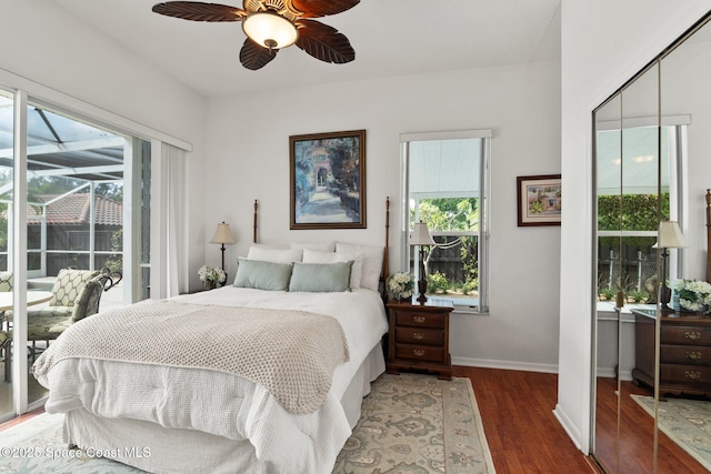 1495 Newfound Harbor Dr, Merritt Island, FL 32952 - bedroom with baseboards, ceiling fan, and wood finished floors