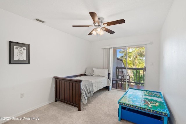 1495 Newfound Harbor Dr, Merritt Island, FL 32952 - bedroom with carpet flooring, access to exterior, a ceiling fan, baseboards, and visible vents