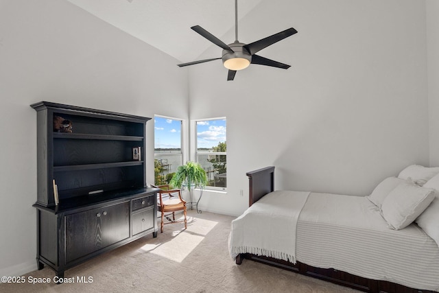 1495 Newfound Harbor Dr, Merritt Island, FL 32952 - carpeted bedroom with a ceiling fan and high vaulted ceiling