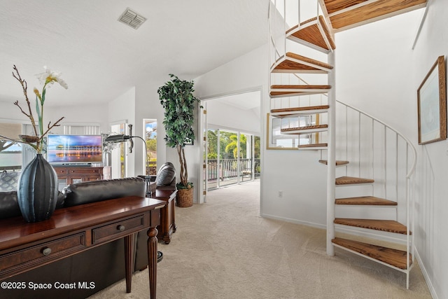1495 Newfound Harbor Dr, Merritt Island, FL 32952 - staircase featuring visible vents and carpet