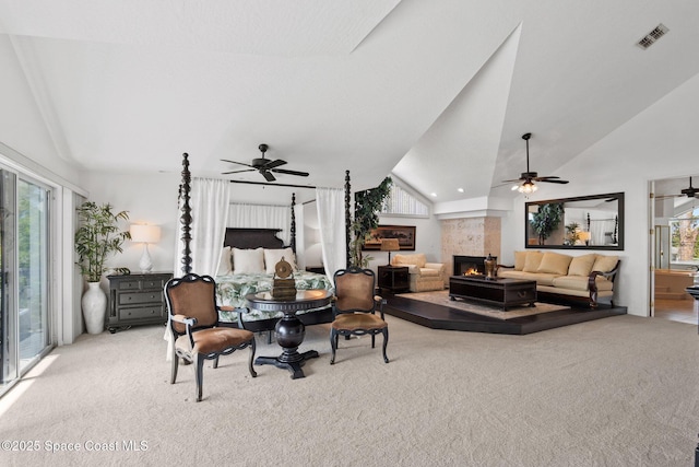 1495 Newfound Harbor Dr, Merritt Island, FL 32952 - carpeted dining area featuring visible vents, a glass covered fireplace, ceiling fan, and vaulted ceiling