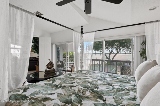 1495 Newfound Harbor Dr, Merritt Island, FL 32952 - bedroom with access to outside, a ceiling fan, vaulted ceiling, and visible vents