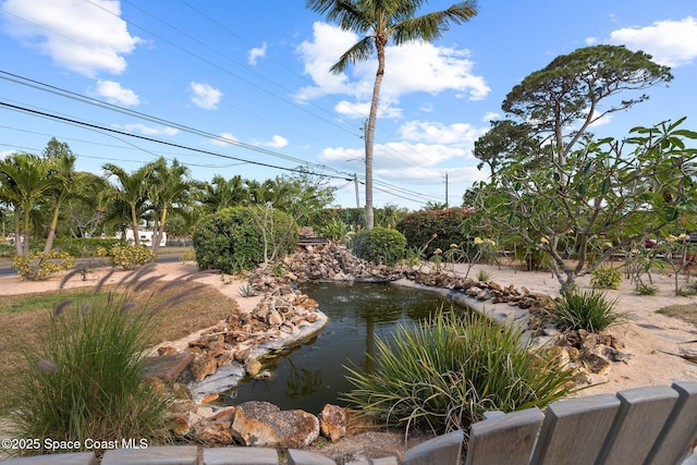 1495 Newfound Harbor Dr, Merritt Island, FL 32952 - exterior space featuring a garden pond