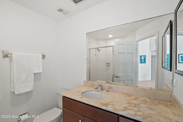 1495 Newfound Harbor Dr, Merritt Island, FL 32952 - bathroom with vanity, a stall shower, toilet, and visible vents