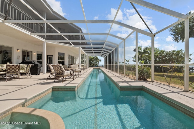 1495 Newfound Harbor Dr, Merritt Island, FL 32952 - outdoor pool featuring a patio, a lanai, and an outdoor hangout area
