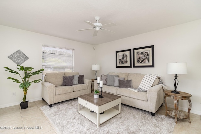 53 Piney Branch Way Unit D, West Melbourne, FL 32904 - living area featuring baseboards, ceiling fan, and light tile patterned floors