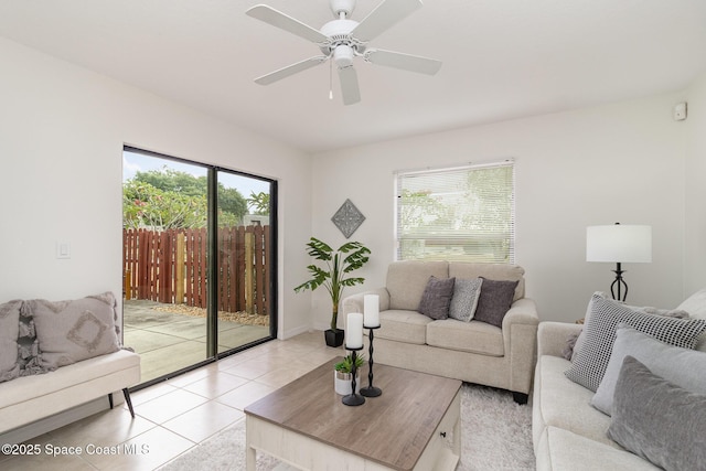 53 Piney Branch Way Unit D, West Melbourne, FL 32904 - living area with ceiling fan and light tile patterned floors