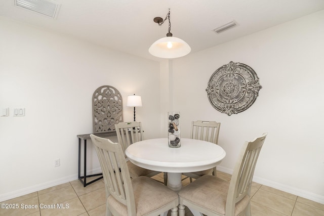 53 Piney Branch Way Unit D, West Melbourne, FL 32904 - dining area with baseboards, visible vents, and light tile patterned floors