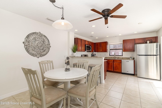 53 Piney Branch Way Unit D, West Melbourne, FL 32904 - dining room featuring visible vents, baseboards, ceiling fan, recessed lighting, and light tile patterned floors