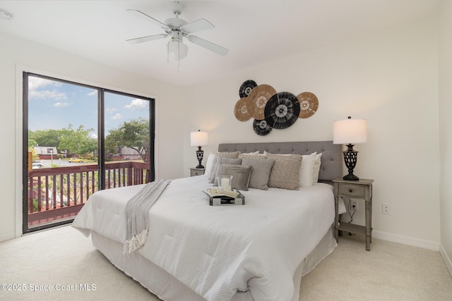 53 Piney Branch Way Unit D, West Melbourne, FL 32904 - carpeted bedroom featuring baseboards, access to outside, and ceiling fan
