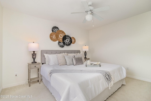 53 Piney Branch Way Unit D, West Melbourne, FL 32904 - bedroom featuring baseboards, a ceiling fan, and carpet