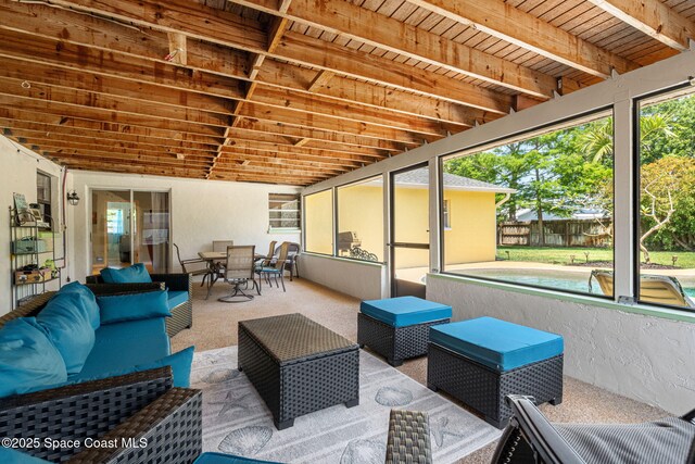 view of patio / terrace with an outdoor living space, outdoor dining area, and fence