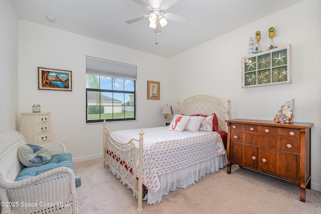 10033 W Verona Cir, Vero Beach, FL 32966 - carpeted bedroom with baseboards and ceiling fan