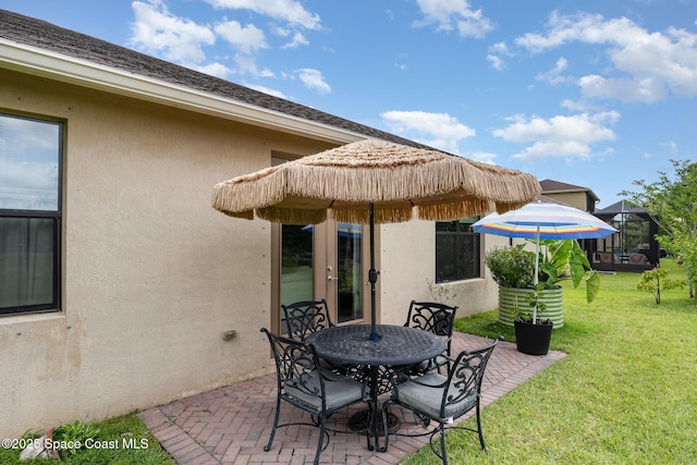 10033 W Verona Cir, Vero Beach, FL 32966 - view of patio / terrace featuring outdoor dining area