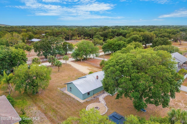 bird's eye view featuring a view of trees
