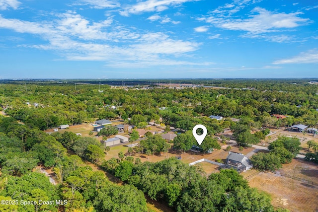 drone / aerial view with a forest view