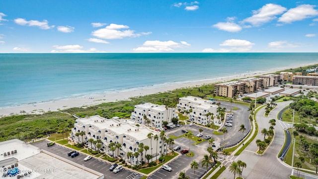 8600 Ridgewood Ave Unit 1208, Cape Canaveral, FL 32920 - drone / aerial view with a view of the beach and a water view