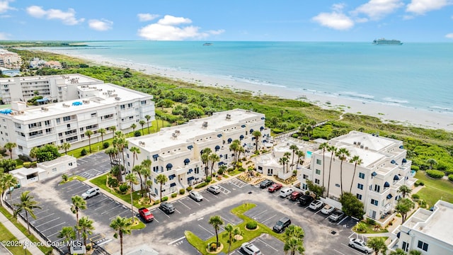 8600 Ridgewood Ave Unit 1208, Cape Canaveral, FL 32920 - drone / aerial view with a view of the beach and a water view