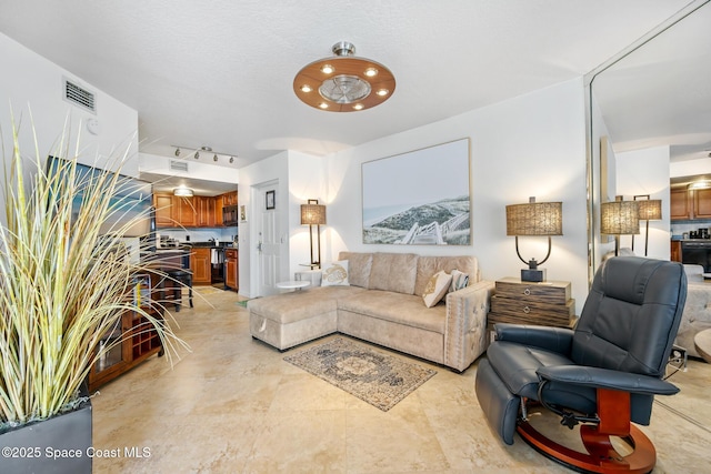 8600 Ridgewood Ave Unit 1208, Cape Canaveral, FL 32920 - living area featuring visible vents