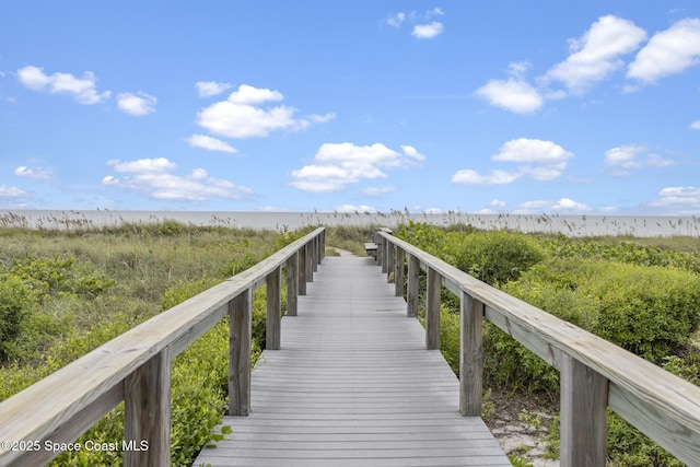 8600 Ridgewood Ave Unit 1208, Cape Canaveral, FL 32920 - dock area featuring a water view and a view of the beach