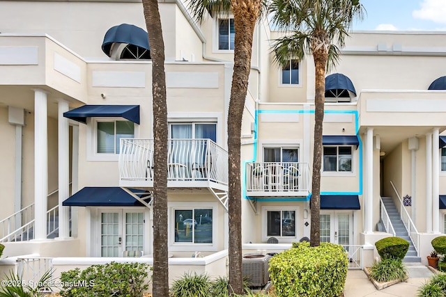 8600 Ridgewood Ave Unit 1208, Cape Canaveral, FL 32920 - view of property featuring central air condition unit