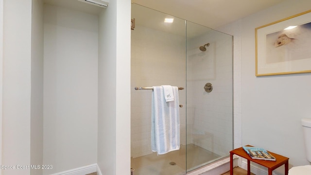 905 N Harbor City Blvd Unit 404, Melbourne, FL 32935 - bathroom featuring a stall shower and toilet