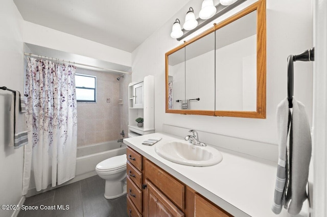 bathroom with toilet, shower / bathtub combination with curtain, and vanity