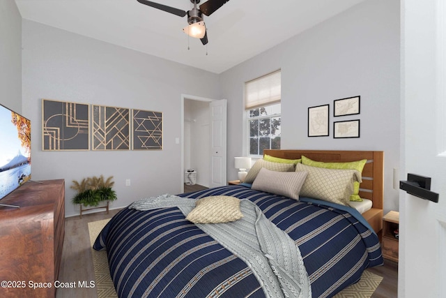 bedroom featuring a ceiling fan and wood finished floors