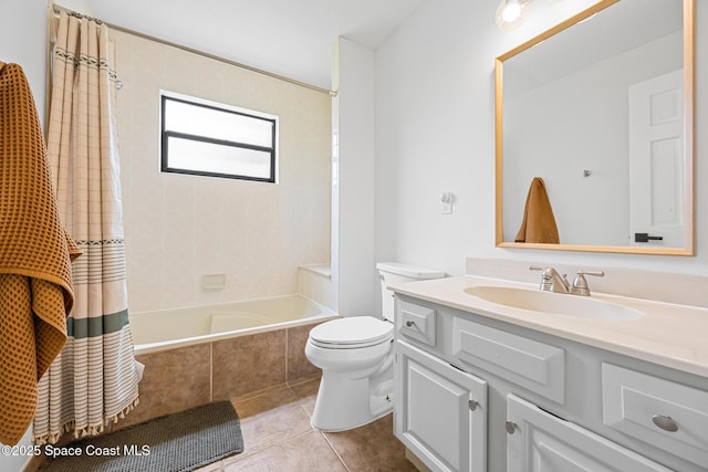 4730 Seminole Trl, Merritt Island, FL 32953 - full bath featuring tiled shower / bath combo, toilet, tile patterned floors, and vanity
