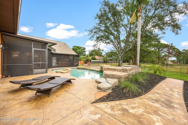 4730 Seminole Trl, Merritt Island, FL 32953 - view of pool featuring an in ground hot tub, a sunroom, a fenced in pool, a fenced backyard, and a patio