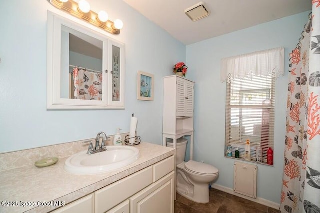 6190 Alderwood Ave, Cocoa, FL 32927 - full bath featuring vanity, toilet, and visible vents