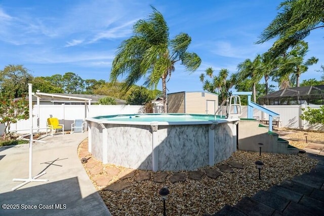 6190 Alderwood Ave, Cocoa, FL 32927 - view of swimming pool featuring a fenced in pool and a fenced backyard