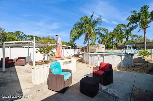 6190 Alderwood Ave, Cocoa, FL 32927 - view of patio with a fenced in pool, a fenced backyard, and a storage shed