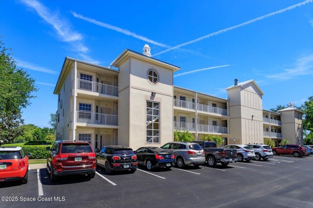 13530 Mystic Dr Unit 5, Sebastian, FL 32958 - view of property with uncovered parking