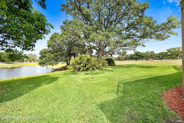 1428 Gleneagles Way, Rockledge, FL 32955 - view of yard featuring a water view