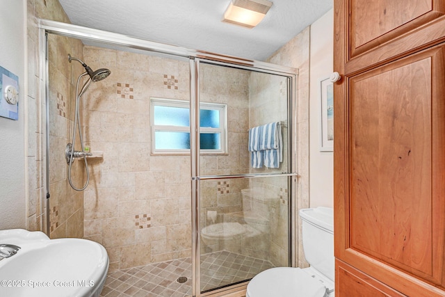 1428 Gleneagles Way, Rockledge, FL 32955 - full bathroom with a stall shower, toilet, a sink, and visible vents