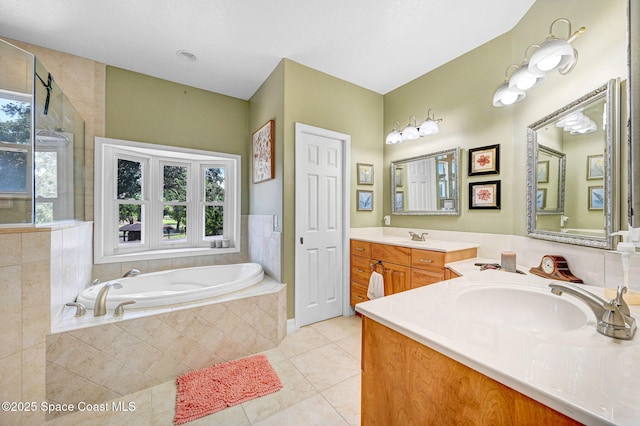 1428 Gleneagles Way, Rockledge, FL 32955 - bathroom featuring walk in shower, tile patterned flooring, a bath, and vanity