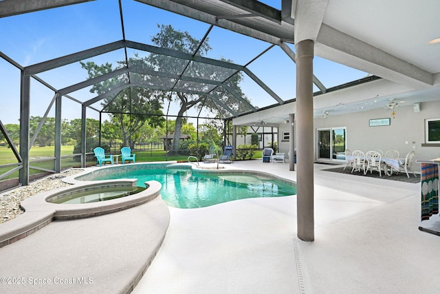 1428 Gleneagles Way, Rockledge, FL 32955 - view of pool with a pool with connected hot tub, a patio area, a ceiling fan, and glass enclosure