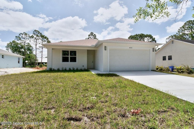 8050 96th Ave, Vero Beach, FL 32967 - ranch-style house with a garage, concrete driveway, a front yard, and stucco siding